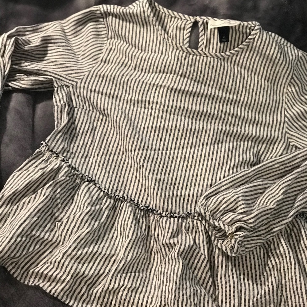 Peplum style top